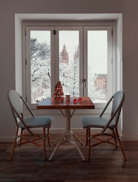 snowy-window-with-christmas-interior-decor_23-2149553479-2467715