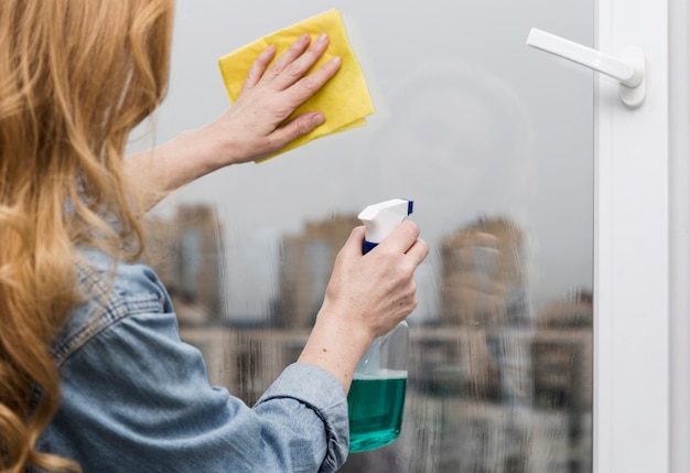 woman-washing-window_23-2148465076-6431313